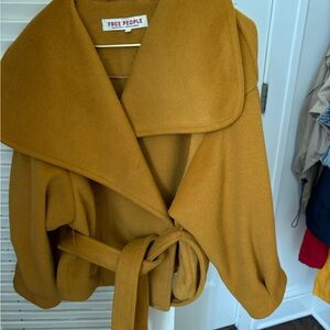 Free people belt tie jacket worn a few times purchased at nordstroms.  Cute